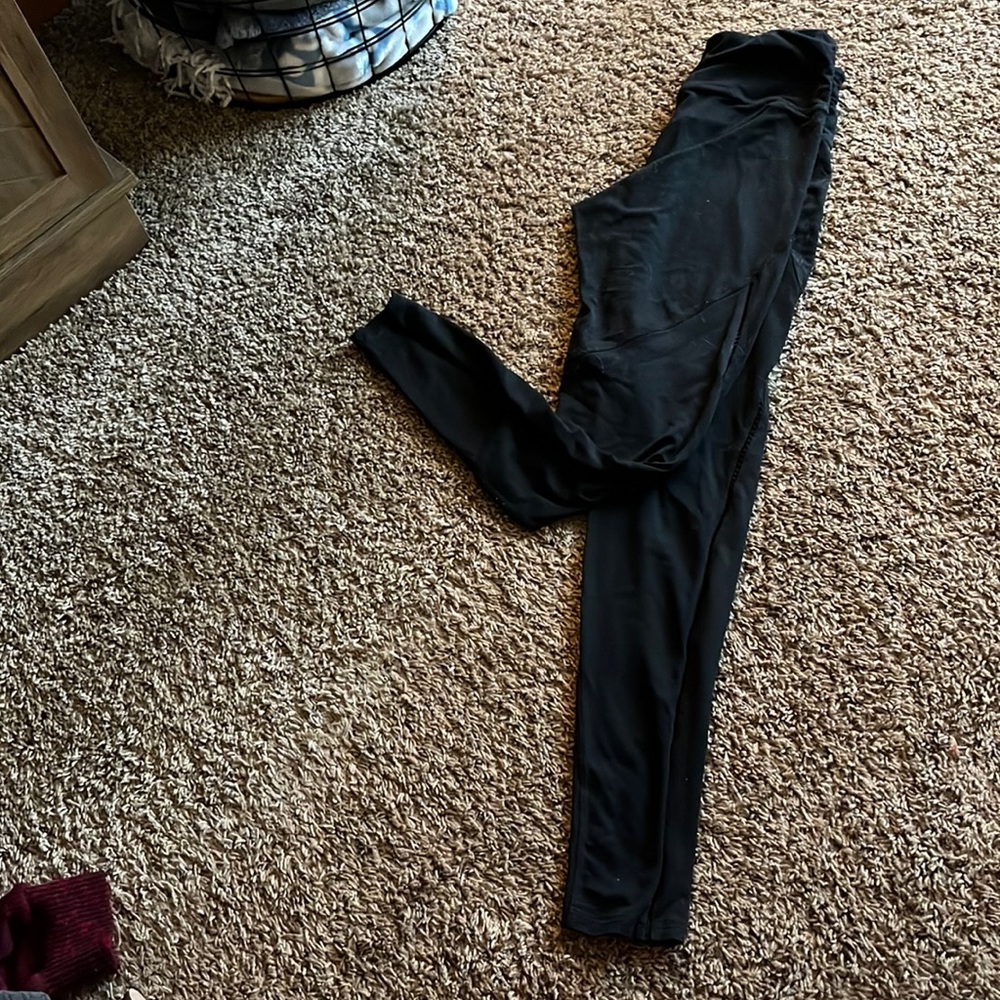 Champion black leggings with cut out side detail.